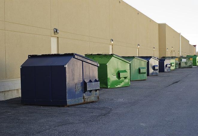 dumpsters lined up waiting to be filled with construction waste in Crossett AR